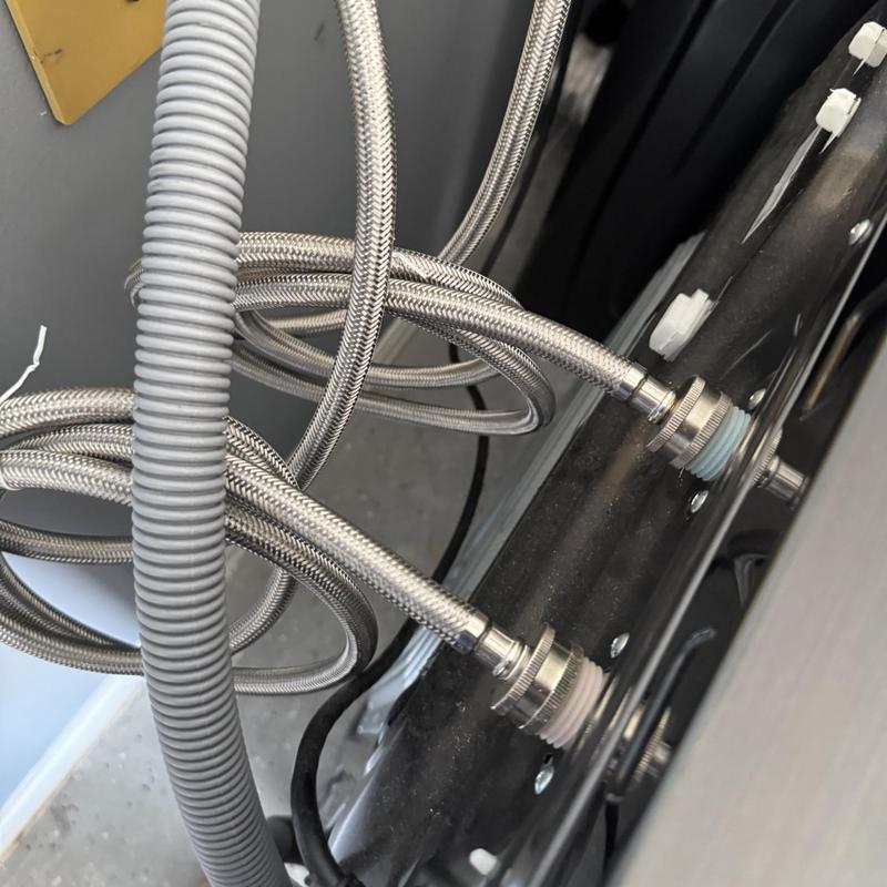 Washing machine stainless steel braided hoses installed