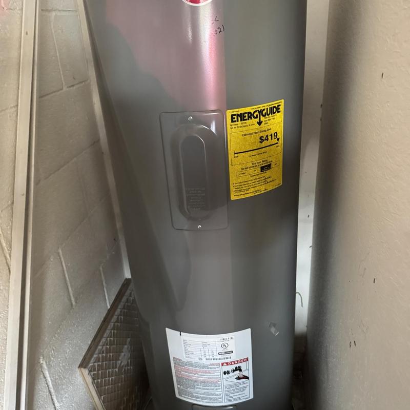 Water heater with energy guide label on tank