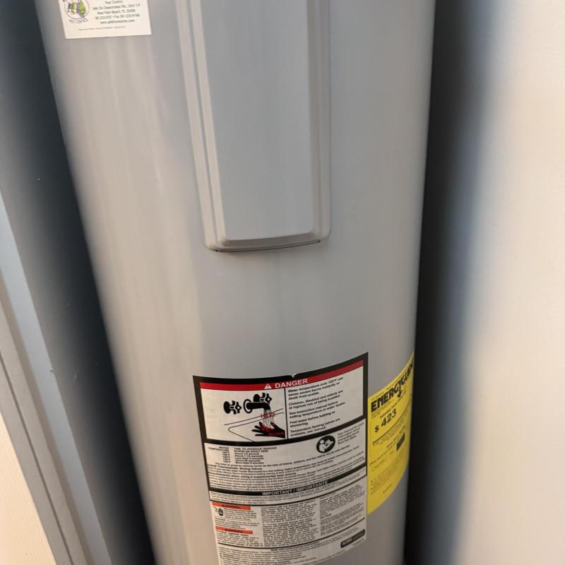 Water heater anode rod replacement with leak test