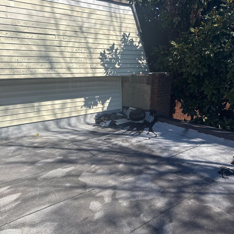 Flat roof membrane with vent and flashing details