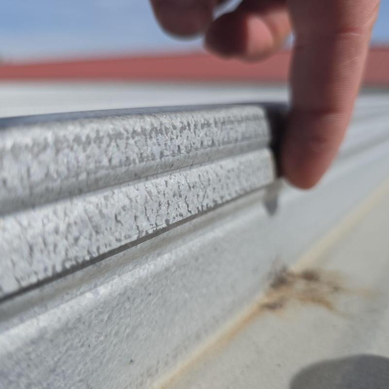 Metal roof panel seam inspection with finger probe