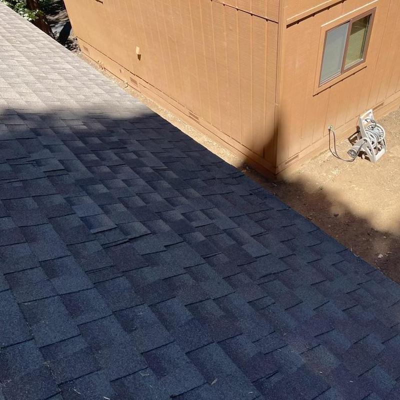 Asphalt shingle roof with storm damage repairs in Sonora
