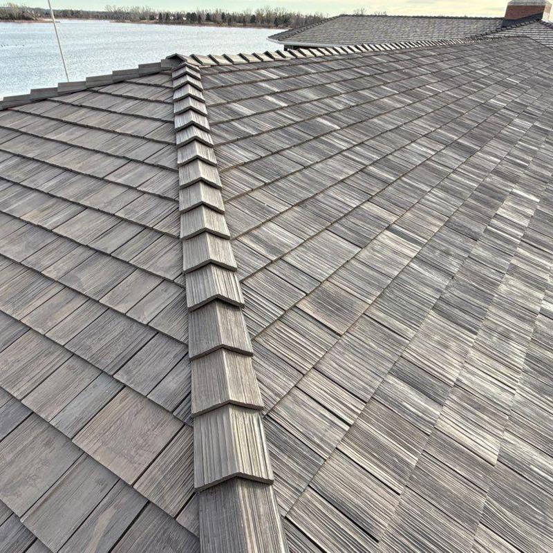 Brava Cedar Shake synthetic shingles on roof ridge