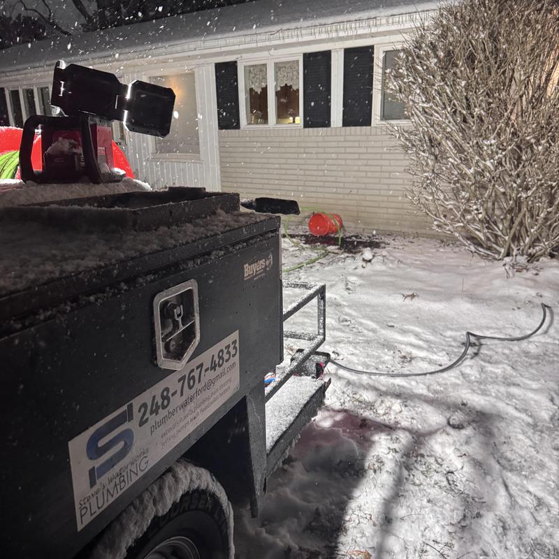 Hydro jetted sewer cleaning equipment in snow