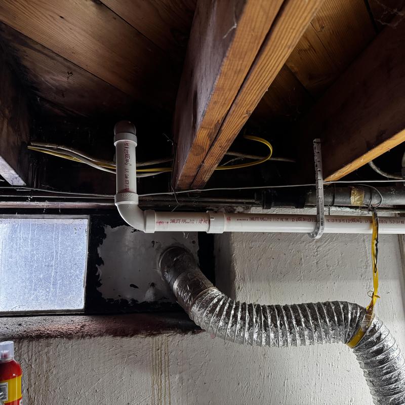 PVC discharge line for water powered sump pump