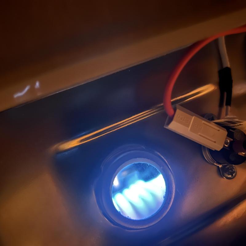 Gas water heater burner flame with ignition sensor light