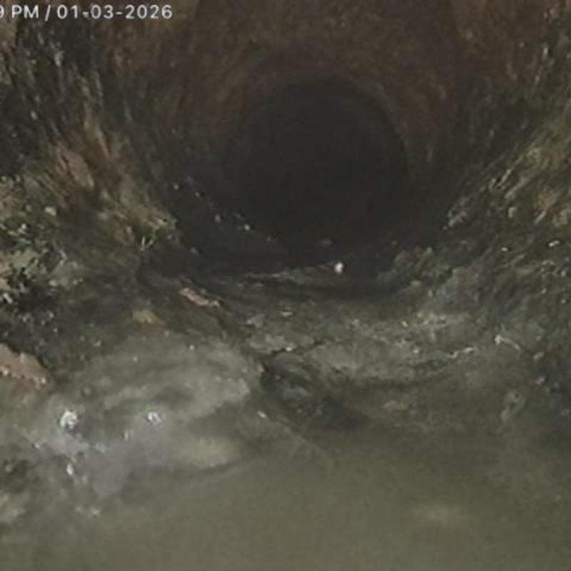 Cast-iron sewer pipe interior flow inspection