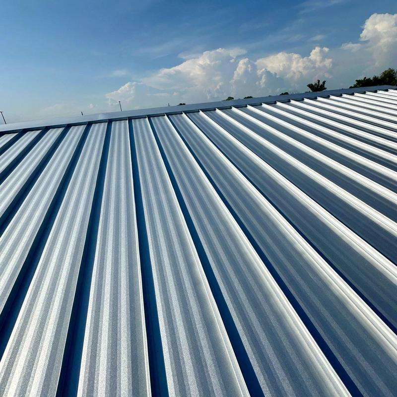 Mechanical lock standing seam metal roof panels