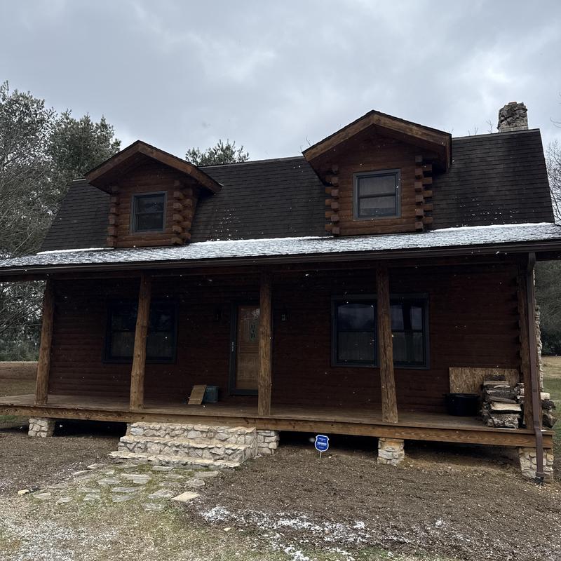 Roof and gutter inspection on wood cabin roof Roof and gutter inspection on wood cabin roof