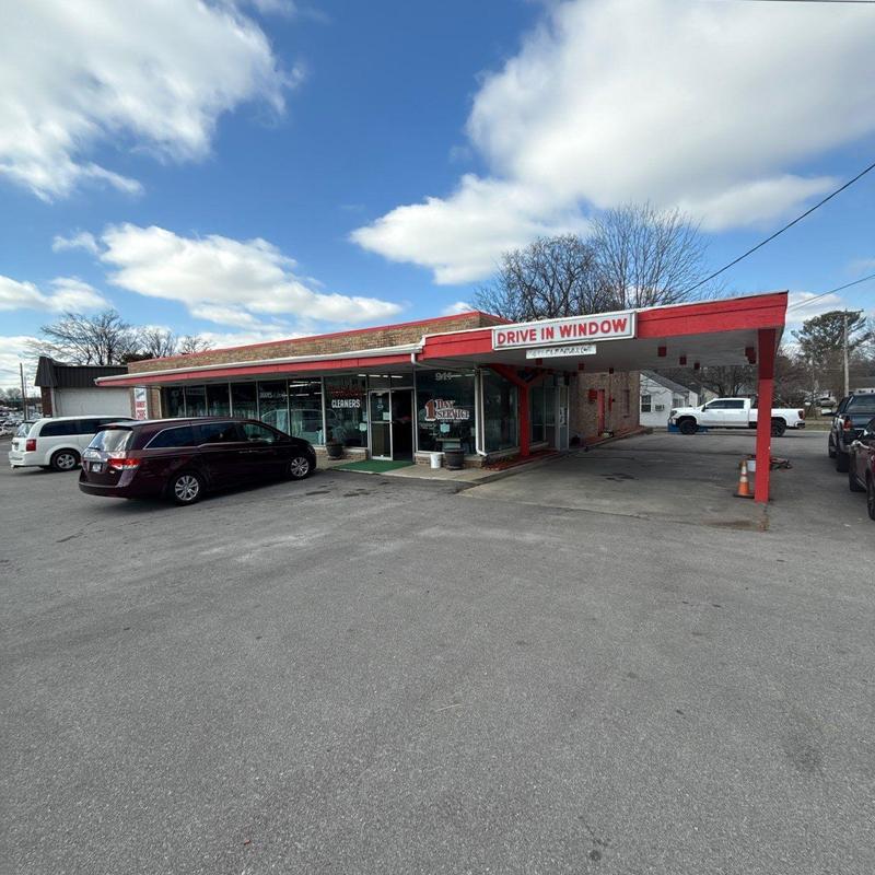 Flat roof with red trim on commercial building