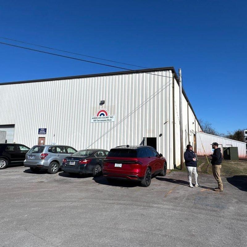 Metal commercial roof with hail damage inspection