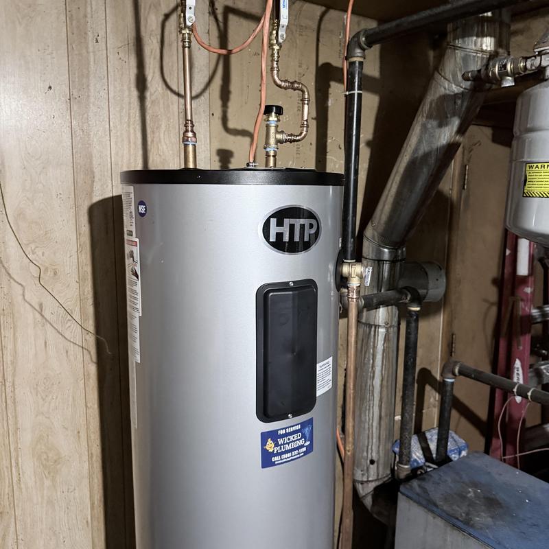 Water heater with lifetime warranty tank installed