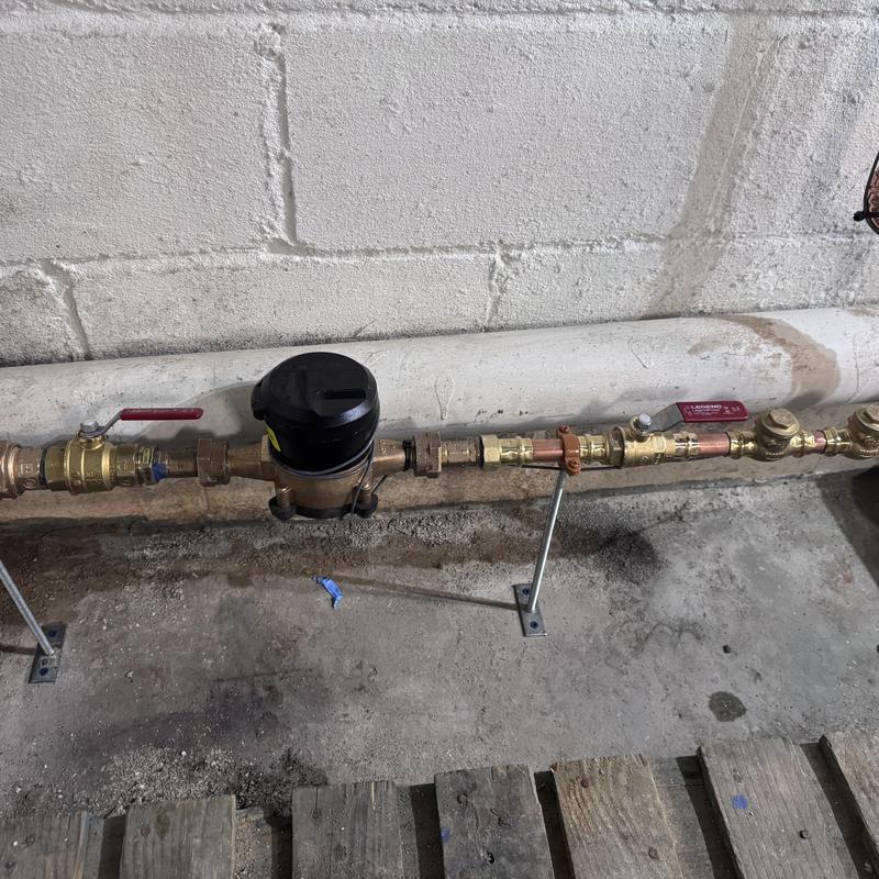 Water meter and poly line installation in basement
