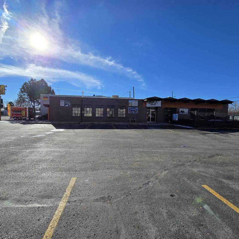 Flat roof with seams and pipe jacks needing repair