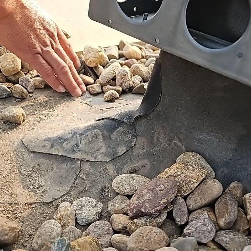 EPDM roof base flashing with seams and rocks inspection EPDM roof base flashing with seams and rocks inspection