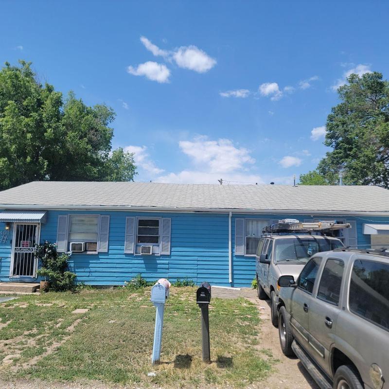 T-Lock shingle roof with hail damage and two layers T-Lock shingle roof with hail damage and two layers