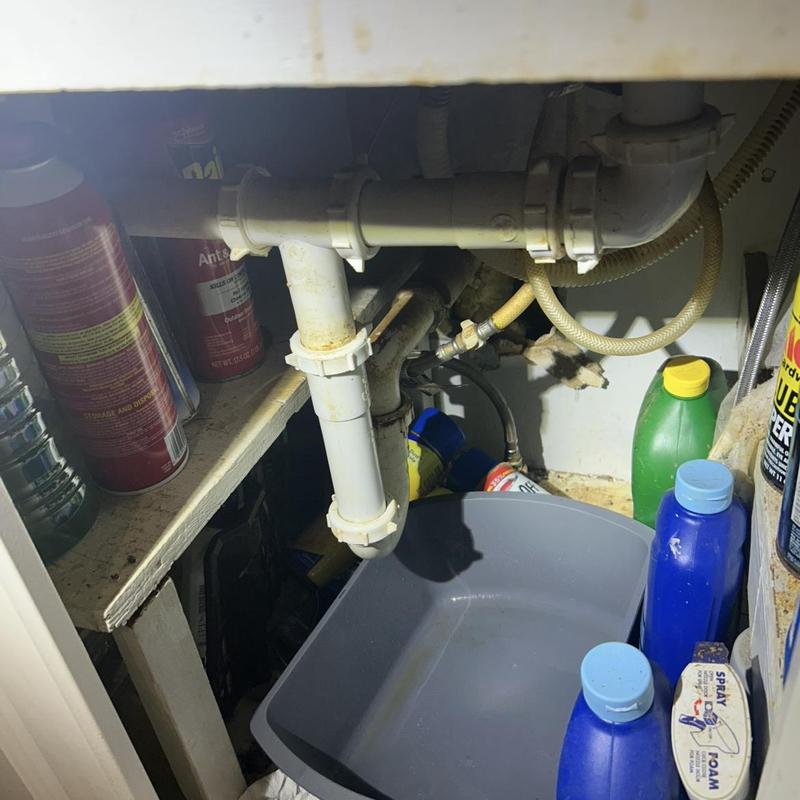 Kitchen sink drain pipes with catch basin and supplies