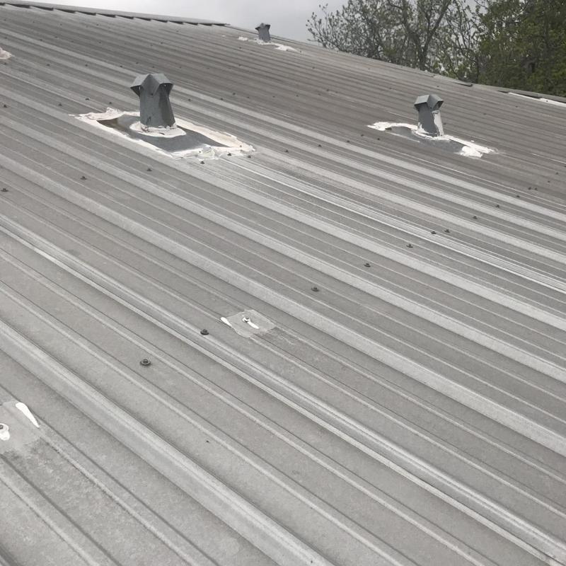 Metal roof with sealed vent pipe fasteners