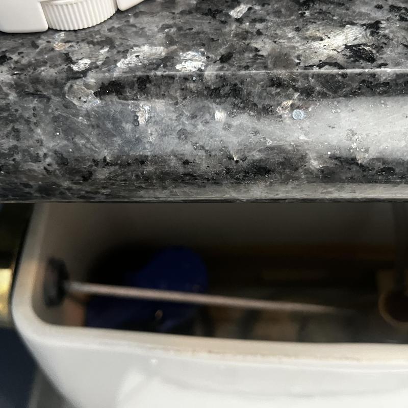 Toilet tank fill valve and lever installation under sink