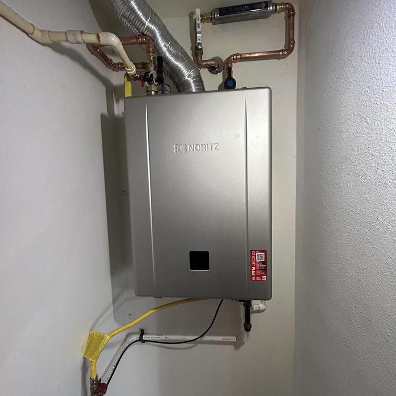 Noritz tankless water heater with copper and gas piping