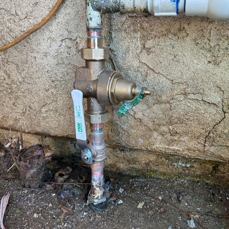 Pressure reducing valve with ball valve on copper pipe