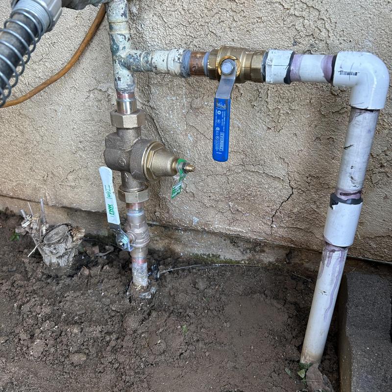 Pressure reducing valve with emergency ball valve and piping