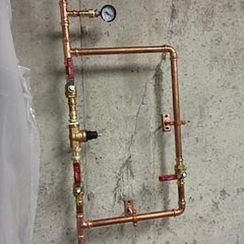 Pressure reducing valve with gauge and shut-off valves