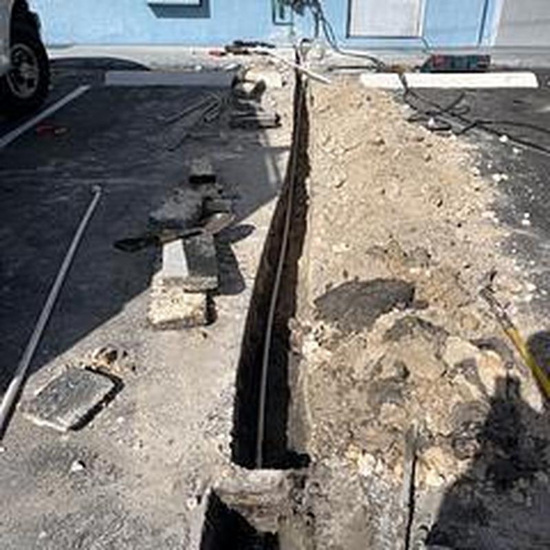 Main water service trench dug for pipe replacement