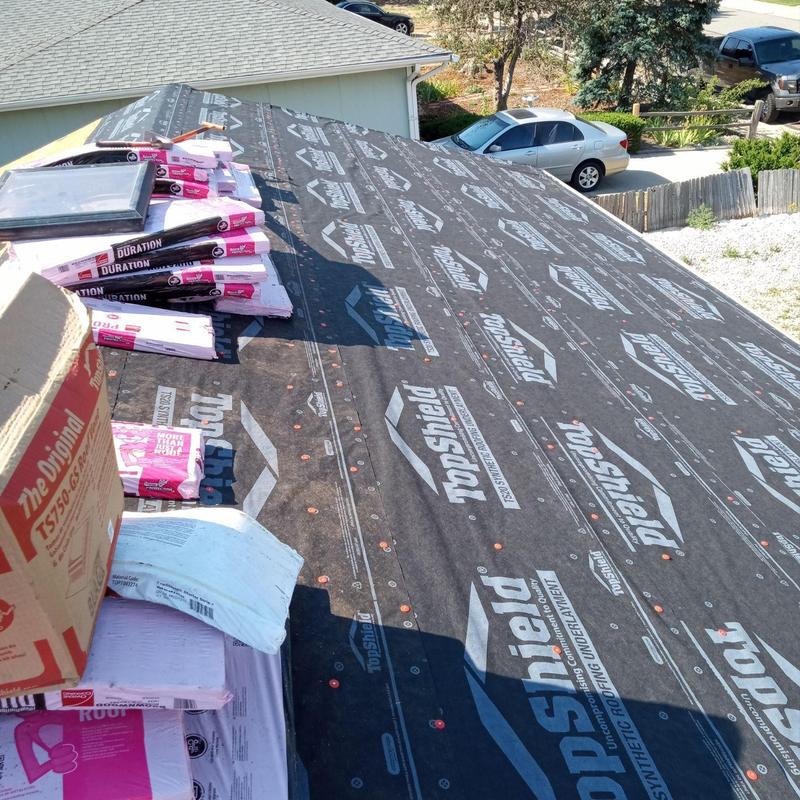 Owens Corning underlayment on residential roof installation Owens Corning underlayment on residential roof installation