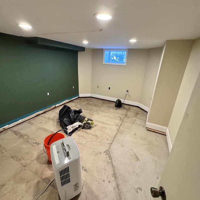 Basement floor and drywall renovation with insulation
