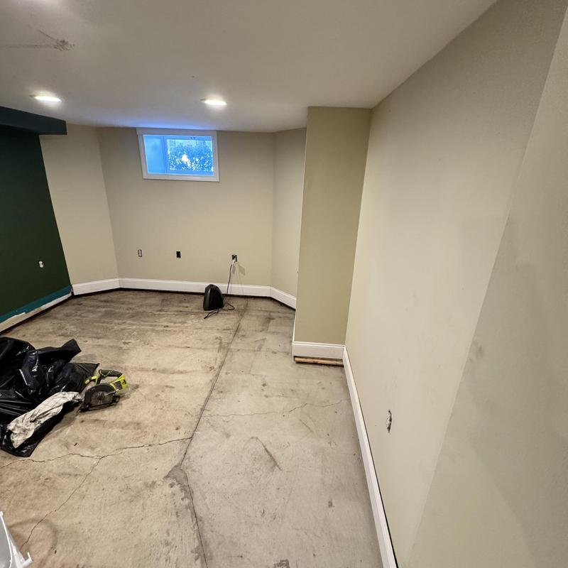 Basement drywall and flooring preparation with insulation