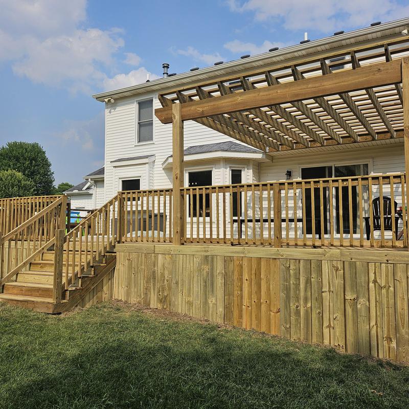 Wooden deck with pergola and railings installation Wooden deck with pergola and railings installation