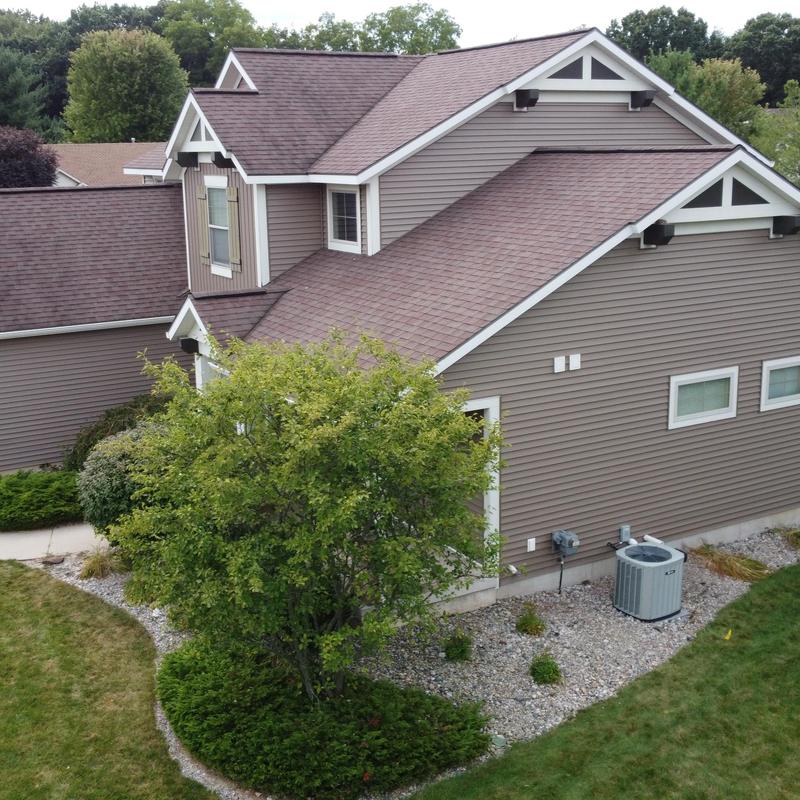 Vinyl siding installation with Tyvek house wrap Vinyl siding installation with Tyvek house wrap