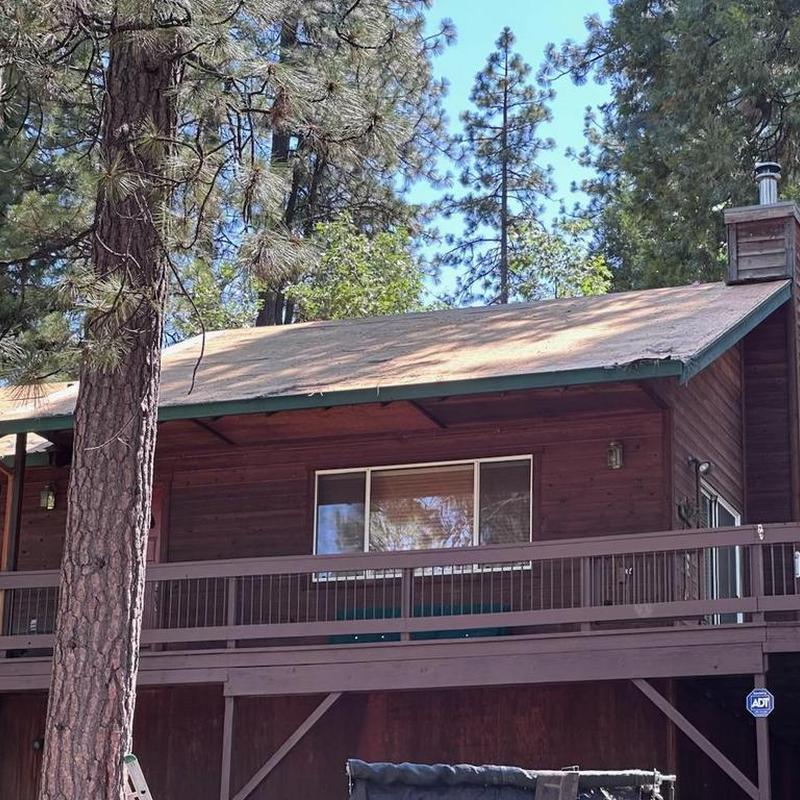 Asphalt GAF roof installation on cabin in Arnold