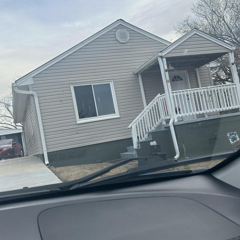 Vinyl siding installation on residential home exterior