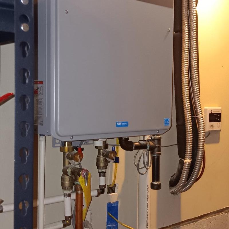 Navien tankless water heater installation in basement