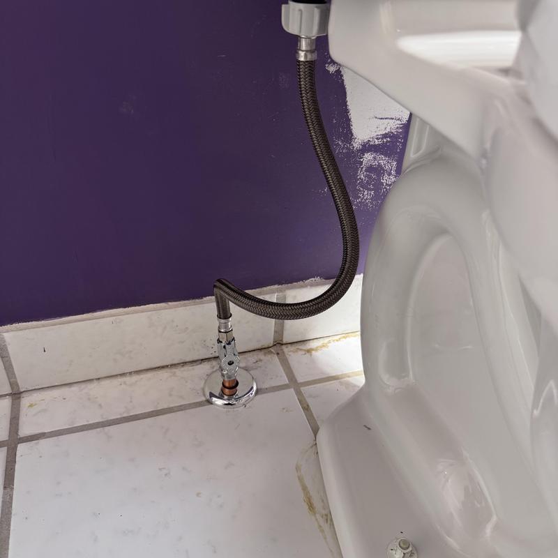 Toilet supply line with angle stop installation