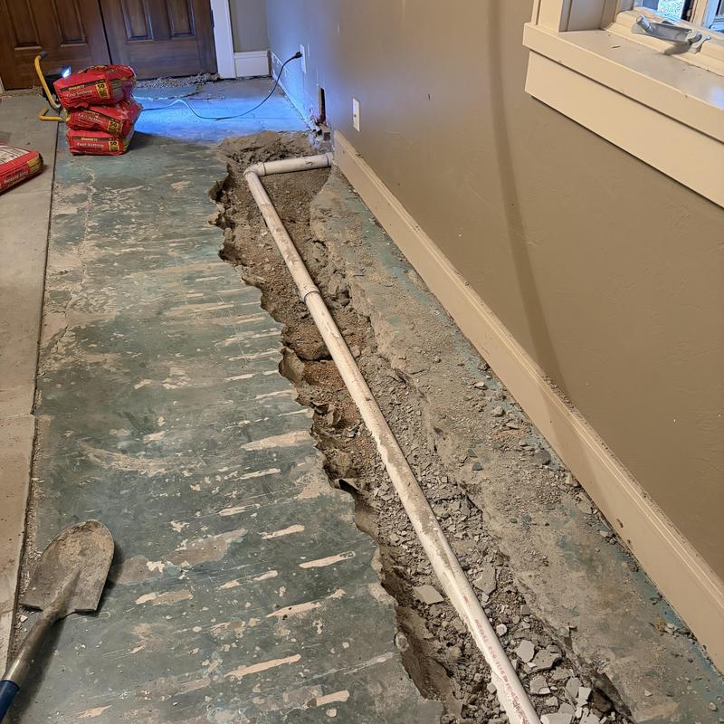 Cast iron kitchen drain pipe replacement trench