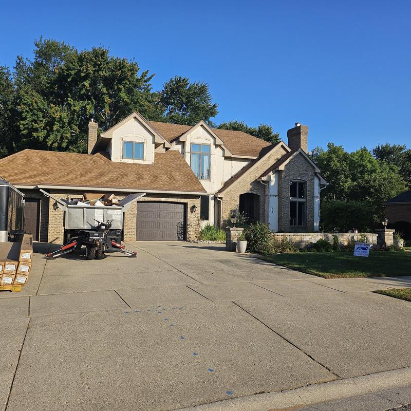Vinyl and composite siding installation on home exterior Vinyl and composite siding installation on home exterior