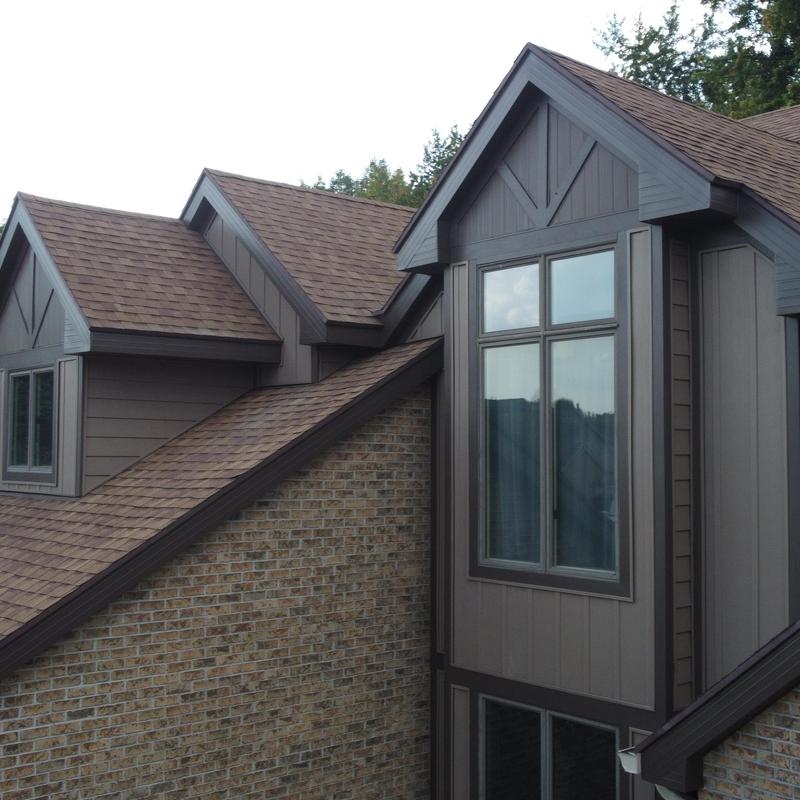 Vertical board and batten siding on home exterior Vertical board and batten siding on home exterior