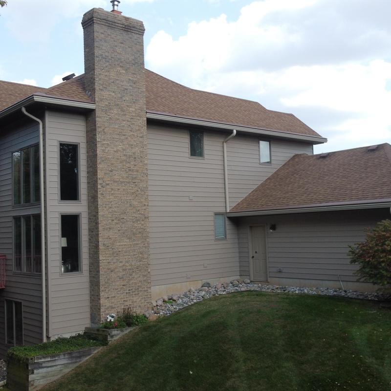 Vinyl lap siding installation on house exterior Vinyl lap siding installation on house exterior