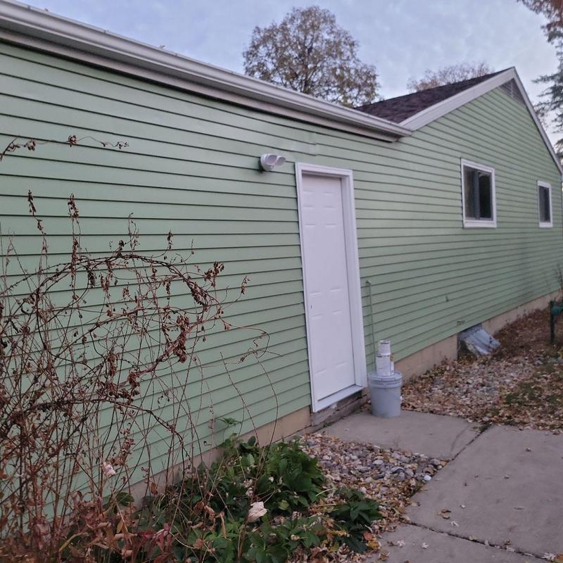 Aluminum siding painted soft mint green in DEWITT Aluminum siding painted soft mint green in DEWITT