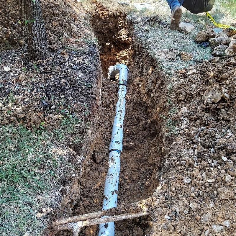 Sanitary sewer line replacement in front yard trench