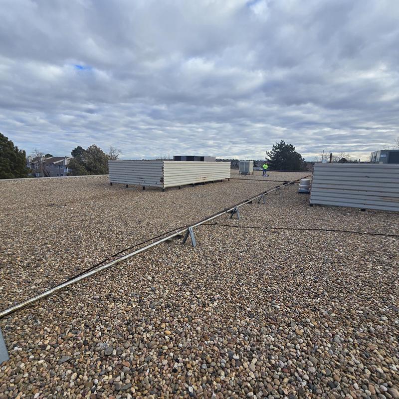 EPDM ballasted flat roof with peeling seams EPDM ballasted flat roof with peeling seams
