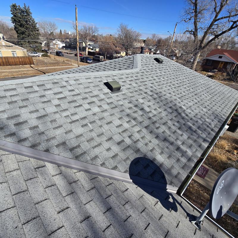 Asphalt shingle roof with sealed pipe jacks and collars Asphalt shingle roof with sealed pipe jacks and collars