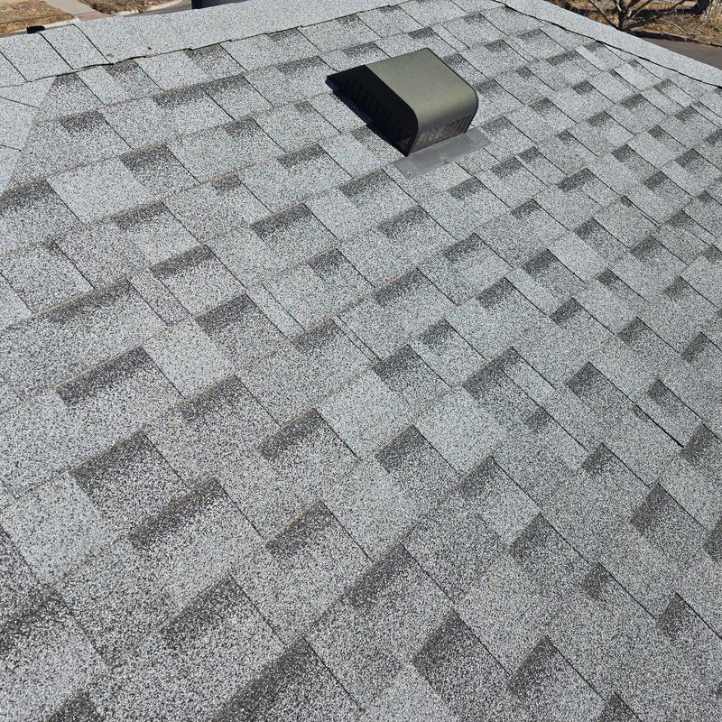 Roof pipe jack and storm collar resealed on asphalt shingles Roof pipe jack and storm collar resealed on asphalt shingles