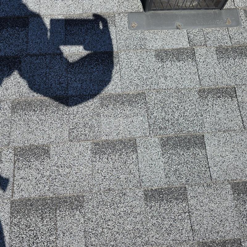 Asphalt shingle roof with resealed pipe jacks and collars Asphalt shingle roof with resealed pipe jacks and collars