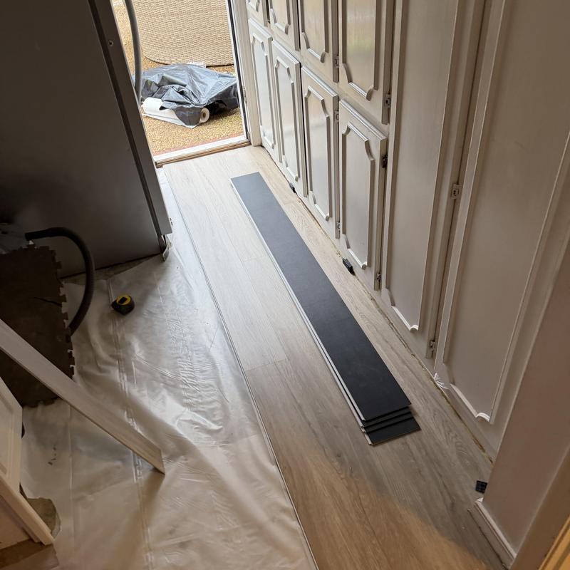 Vinyl plank flooring prep and partial installation Vinyl plank flooring prep and partial installation