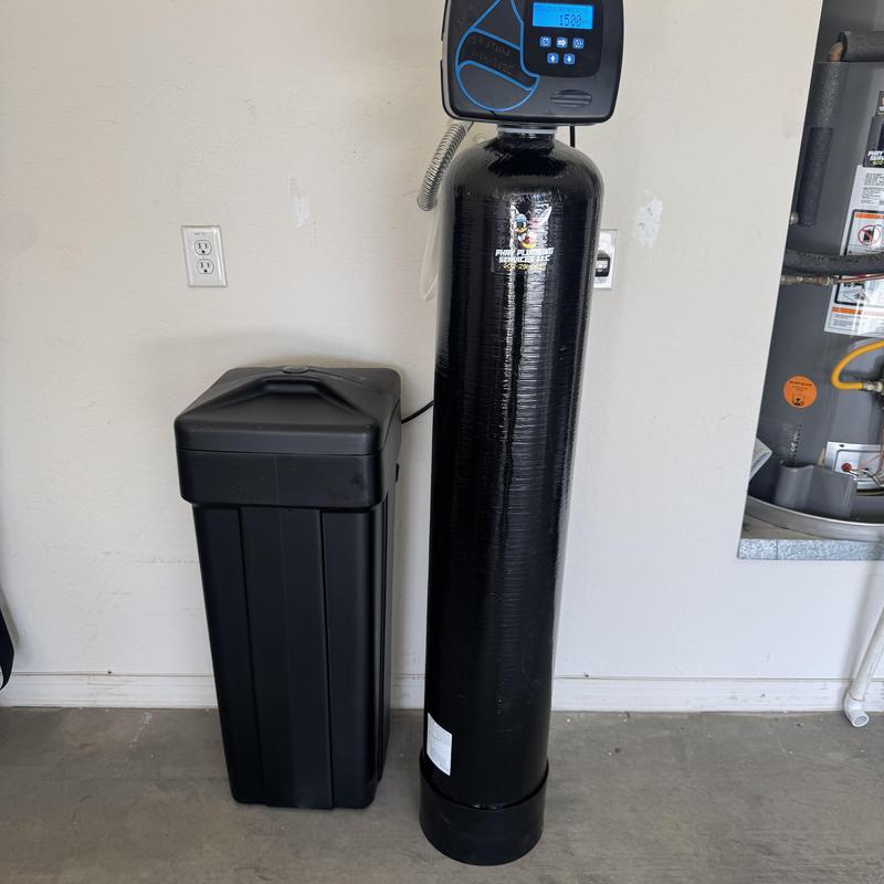 48K Water softener system installed in garage