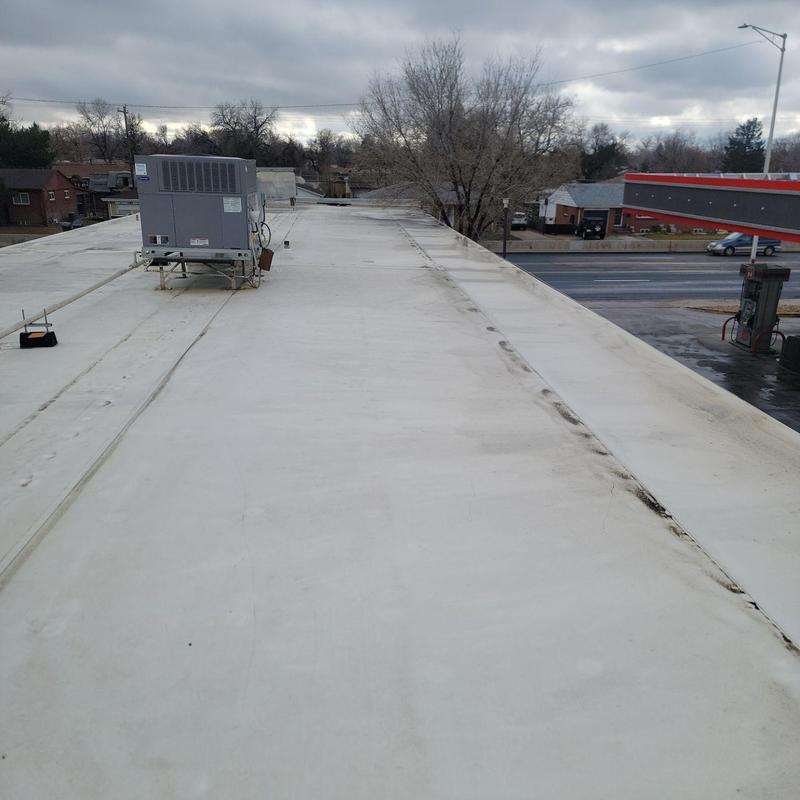 TPO flat roof with HVAC unit and seam repairs TPO flat roof with HVAC unit and seam repairs
